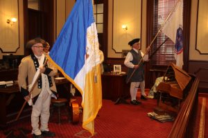 2024 Michael T. Mangum and Chares Morgan hold flags