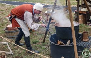 Taber demonstrates fire making for brewing