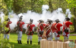 members of the NJ First Volunteers volley