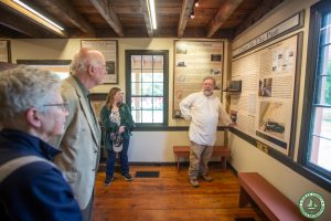 Tim Hart explains archeological display