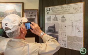 guest examines HABS display