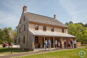 guests at rear door of Cedar Bridge Tavern