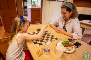 two women play chess