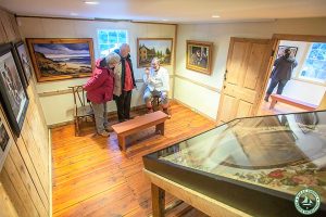 Inside upstairs room Tim Hart explains