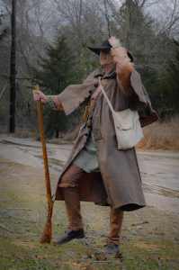 Dick Chinery stands with weapon