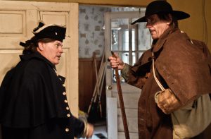 two period soldiers stand next to each other