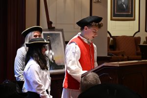 2025 TRHSS Student stands to speak from pews