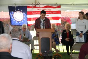 2021 male student from TRHS South under tent