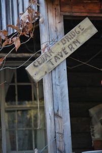 Cedar Bridge Tavern wooden sign