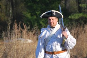 historic interpreter with brown bess