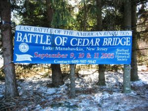 Banner for Battle of Cedar Bridge at Lake Manahawkin September 9, 10 & 11 2005 between trees at Cedar Bridge Tavern