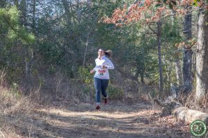 smiling runner at 5k