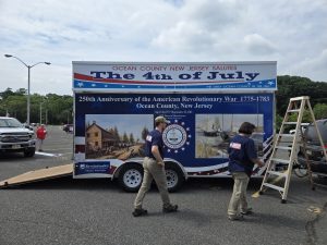 Joseph and Samantha walk towards ladder at Monmouth parade