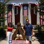 07.04.2026 Commissioners Rob and Jennifier stand by Soper Liberty Bell