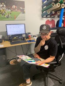 John Cuccinello picking colors for 250th art work