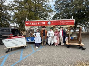 2026 WaWa practice in front of trailer, boat and bell