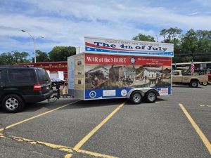Monmouth county 250 parade in parking lot at railroad station