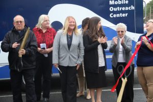 ribbon cutting ceremony of new mobile outreach unit