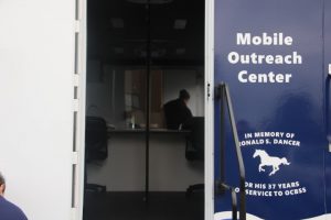 ribbon cutting ceremony of new mobile outreach unit