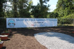 grand opening of the Sadie Vickers CommUnity Garden was celebrated with a ribbon cutting ceremony