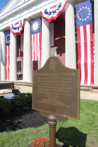 unveiling the plaque provided by the Captain Joshua Huddy Chapter of the DAR