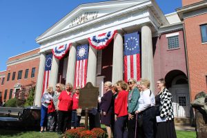 unveiling the plaque provided by the Captain Joshua Huddy Chapter of the DAR