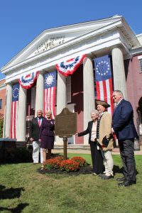 unveiling the plaque provided by the Captain Joshua Huddy Chapter of the DAR