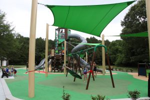 Ribbon cutting ceremony of the new playground at Eno's Pond County Park