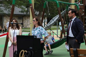 Ribbon cutting ceremony of the new playground at Eno's Pond County Park