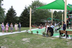 Ribbon cutting ceremony of the new playground at Eno's Pond County Park