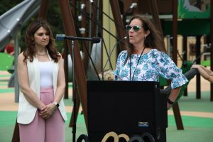 Ribbon cutting ceremony of the new playground at Eno's Pond County Park