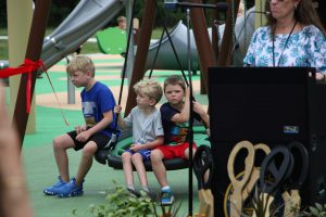 Ribbon cutting ceremony of the new playground at Eno's Pond County Park
