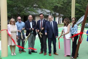 Ribbon cutting ceremony of the new playground at Eno's Pond County Park