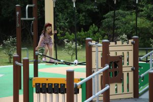Ribbon cutting ceremony of the new playground at Eno's Pond County Park