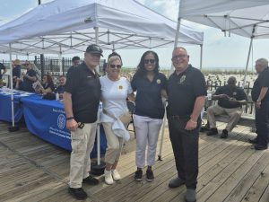 Ocean County Commissioner Robert Arace joins the NJ Attorney General's Office and the Ocean County Consumer Affairs Department to promote safe summers on the Seaside Boardwalk