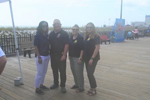 Ocean County Commissioner Robert Arace joins the NJ Attorney General's Office and the Ocean County Consumer Affairs Department to promote safe summers on the Seaside Boardwalk