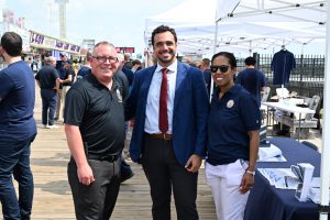 Ocean County Commissioner Robert Arace joins the NJ Attorney General's Office and the Ocean County Consumer Affairs Department to promote safe summers on the Seaside Boardwalk
