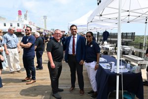 Ocean County Commissioner Robert Arace joins the NJ Attorney General's Office and the Ocean County Consumer Affairs Department to promote safe summers on the Seaside Boardwalk