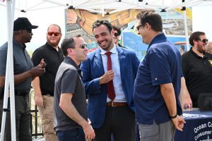 Ocean County Commissioner Robert Arace joins the NJ Attorney General's Office and the Ocean County Consumer Affairs Department to promote safe summers on the Seaside Boardwalk