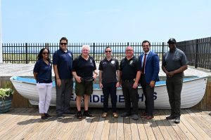 Ocean County Commissioner Robert Arace joins the NJ Attorney General's Office and the Ocean County Consumer Affairs Department to promote safe summers on the Seaside Boardwalk