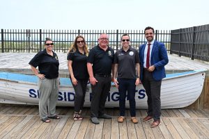 Ocean County Commissioner Robert Arace joins the NJ Attorney General's Office and the Ocean County Consumer Affairs Department to promote safe summers on the Seaside Boardwalk