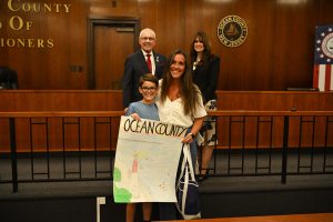 Four fourth graders from Ocean County schools were recognized by the Ocean County Board of Commissioners, and the Ocean County Deputy Clerk for their winning entries in the annual “My County Poster Contest.”