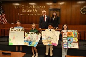 Four fourth graders from Ocean County schools were recognized by the Ocean County Board of Commissioners, and the Ocean County Deputy Clerk for their winning entries in the annual “My County Poster Contest.”