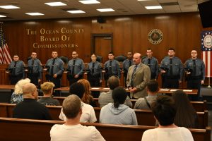 Ocean County Commissioners Sam Ellenbogen and Ray Gormley welcomed 10 new Corrections Officers to Ocean County during a swearing in ceremony on June 10. Ellenbogen and Gormley, liaisons to the Ocean County Corrections Department, administered the oath to the new officers.
