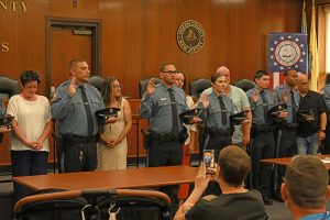 Ocean County Commissioners Sam Ellenbogen and Ray Gormley welcomed 10 new Corrections Officers to Ocean County during a swearing in ceremony on June 10. Ellenbogen and Gormley, liaisons to the Ocean County Corrections Department, administered the oath to the new officers.