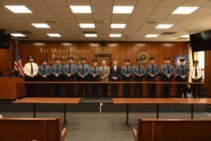 Ocean County Commissioners Sam Ellenbogen and Ray Gormley welcomed 10 new Corrections Officers to Ocean County during a swearing in ceremony on June 10. Ellenbogen and Gormley, liaisons to the Ocean County Corrections Department, administered the oath to the new officers.