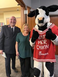 Attendees and Chick-Fil-A Mascot